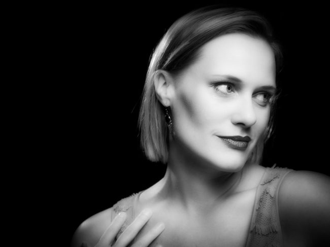 black and white studio portrait of a female model