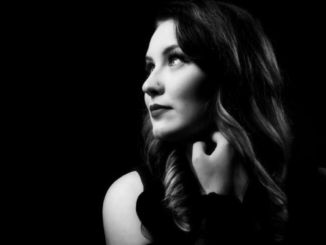 black and white studio portrait of a female model